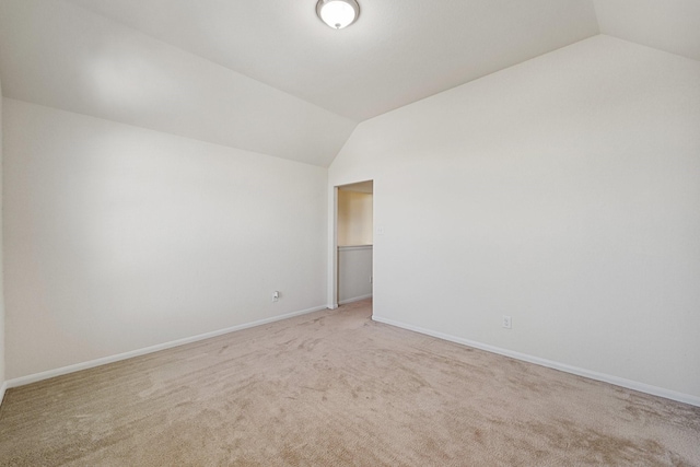 1902 Red Cedar Trl, Rosenberg, TX 77471 - additional living space featuring baseboards, light carpet, and vaulted ceiling