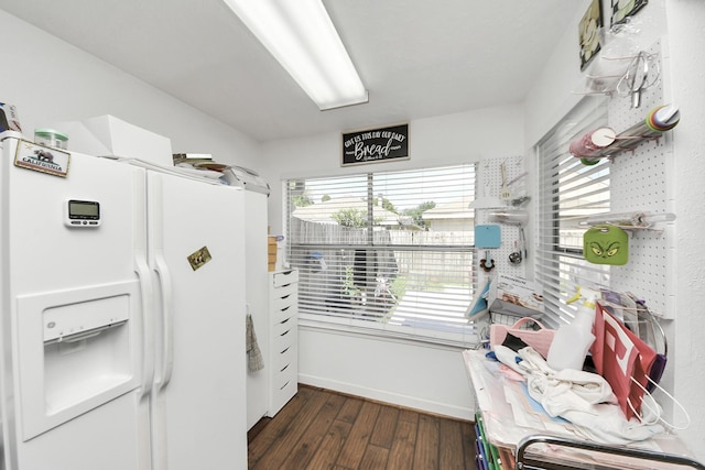 6230 Grandvale Dr, Houston, TX 77072 - kitchen with white fridge with ice dispenser, baseboards, and wood finished floors
