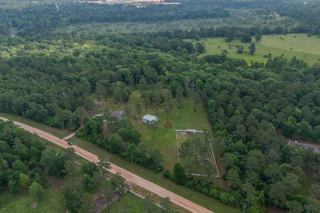 drone / aerial view with a view of trees