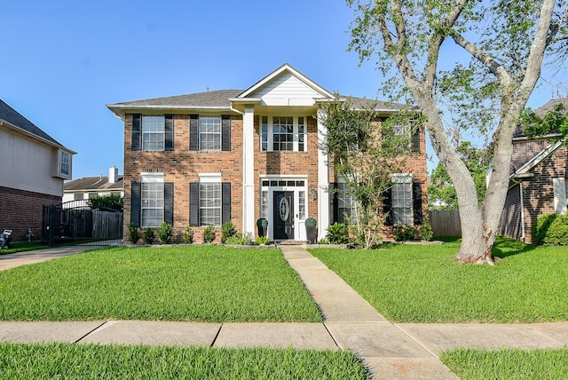 210 Needleleaf Ln, Sugar Land, TX 77479 - greek revival house with brick siding