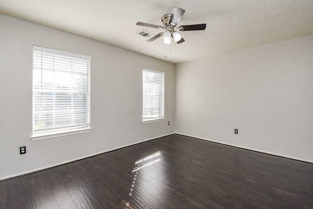 210 Needleleaf Ln, Sugar Land, TX 77479 - unfurnished room with plenty of natural light, dark wood finished floors, and ceiling fan