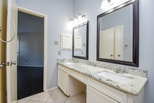 210 Needleleaf Ln, Sugar Land, TX 77479 - bathroom with double vanity and tile patterned floors