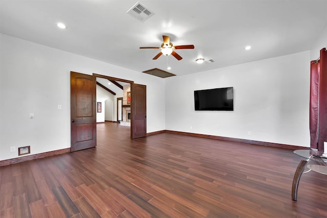 unfurnished living room with a ceiling fan, recessed lighting, baseboards, dark wood-style flooring, and visible vents