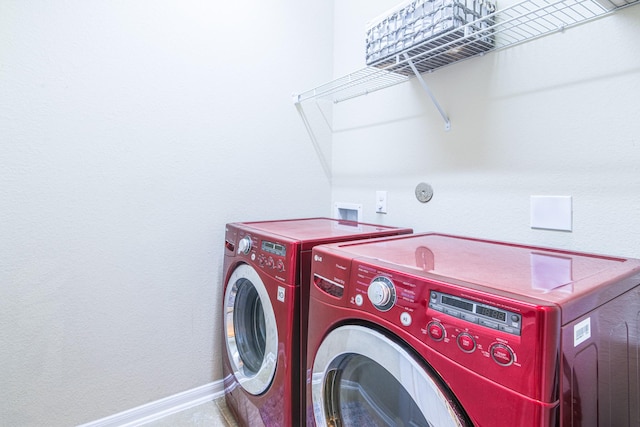 246 Bayside Crossing Dr, La Porte, TX 77571 - clothes washing area with separate washer and dryer, laundry area, and baseboards