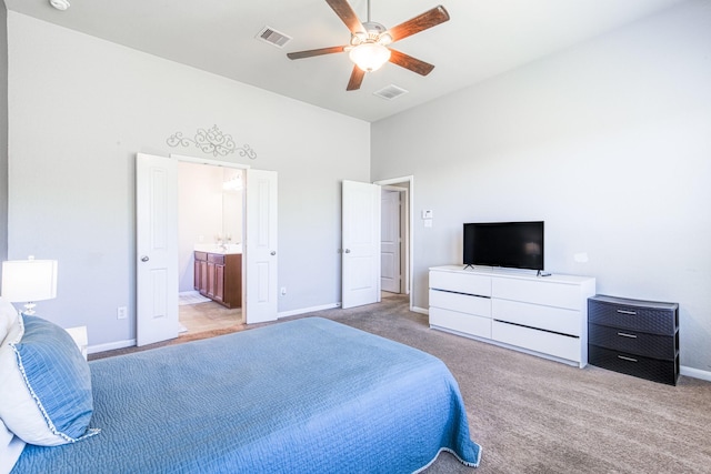246 Bayside Crossing Dr, La Porte, TX 77571 - bedroom with light colored carpet, connected bathroom, baseboards, and visible vents