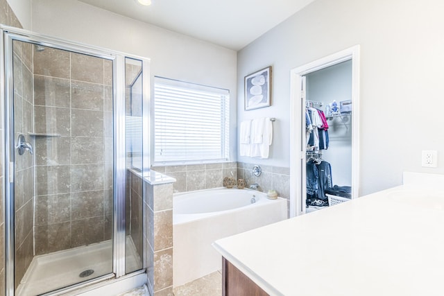 246 Bayside Crossing Dr, La Porte, TX 77571 - full bathroom with a shower stall, a garden tub, vanity, and a walk in closet