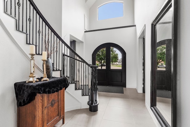 8603 Royal Retreat, Richmond, TX 77469 - tiled foyer entrance featuring stairway and a high ceiling