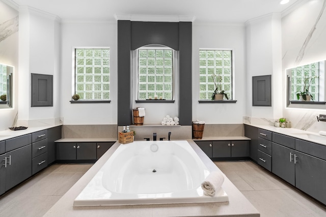 8603 Royal Retreat, Richmond, TX 77469 - bathroom featuring tile patterned floors, a garden tub, vanity, and crown molding