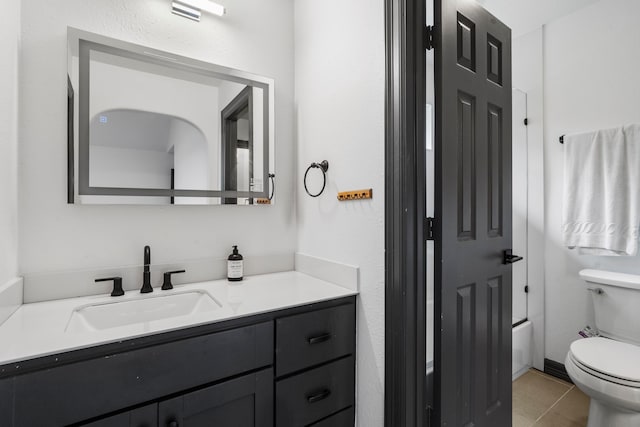 8603 Royal Retreat, Richmond, TX 77469 - full bath featuring a bath, toilet, tile patterned flooring, and vanity