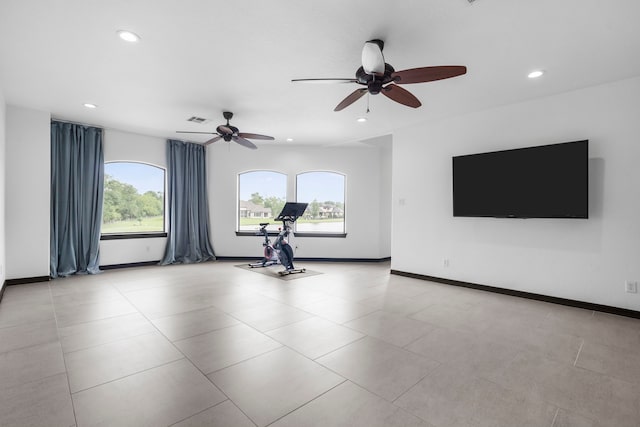 8603 Royal Retreat, Richmond, TX 77469 - unfurnished living room featuring ceiling fan, recessed lighting, a healthy amount of sunlight, and visible vents