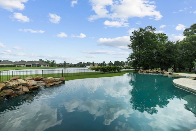 8603 Royal Retreat, Richmond, TX 77469 - view of swimming pool with a lawn, a fenced in pool, and fence