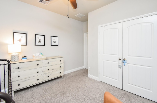 18273 Evanhale Bend Dr, Cypress, TX 77429 - bedroom with light colored carpet, baseboards, a ceiling fan, and a closet