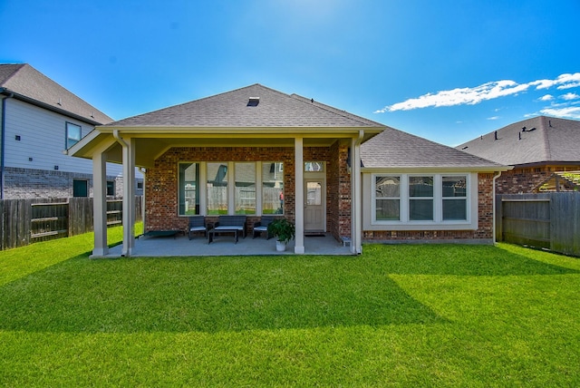 18273 Evanhale Bend Dr, Cypress, TX 77429 - rear view of property with a patio, brick siding, and roof with shingles