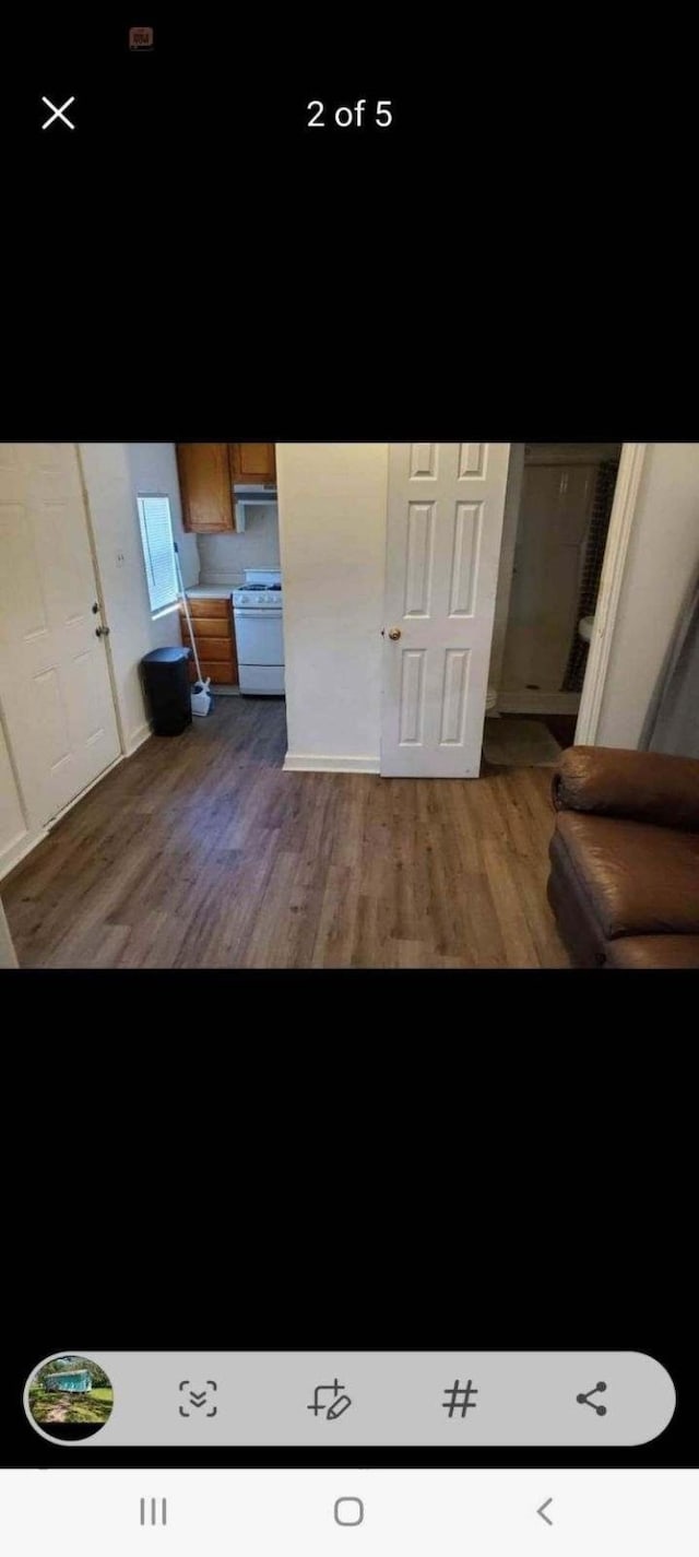 415 5th St, San Leon, TX 77539 - interior space featuring wood finished floors