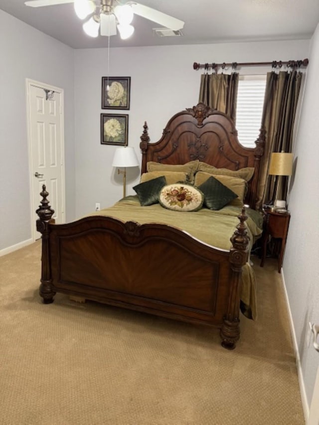 bedroom with light colored carpet, baseboards, a ceiling fan, and visible vents