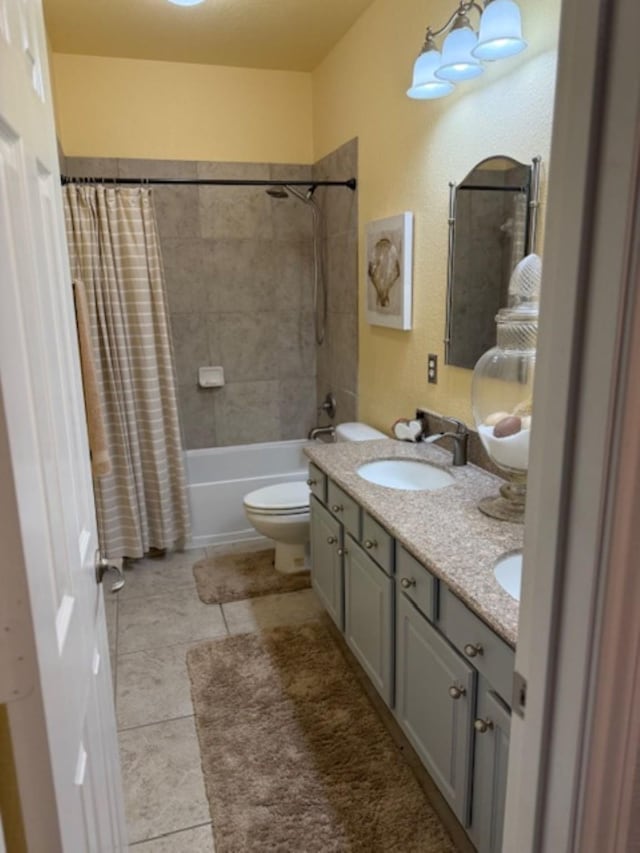 bathroom with toilet, shower / tub combo with curtain, a sink, tile patterned floors, and double vanity