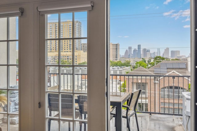 1214 Dunlavy St, Houston, TX 77019 - doorway to outside with a skyline view
