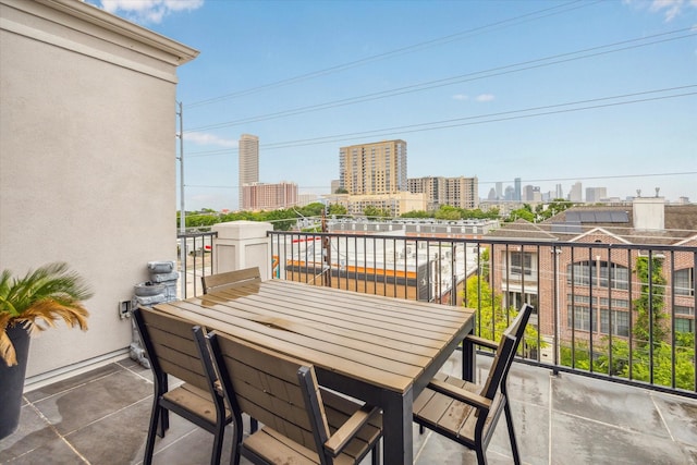 1214 Dunlavy St, Houston, TX 77019 - balcony featuring a skyline view and outdoor dining space