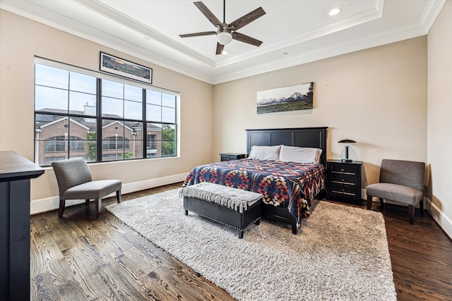 1214 Dunlavy St, Houston, TX 77019 - bedroom featuring dark wood-style flooring, a tray ceiling, crown molding, baseboards, and recessed lighting