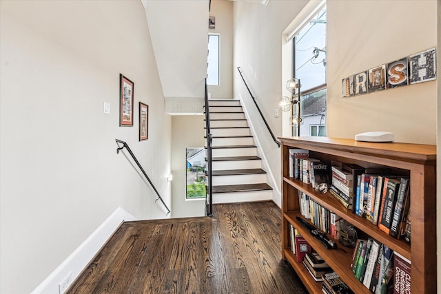 1214 Dunlavy St, Houston, TX 77019 - stairs featuring wood finished floors and baseboards