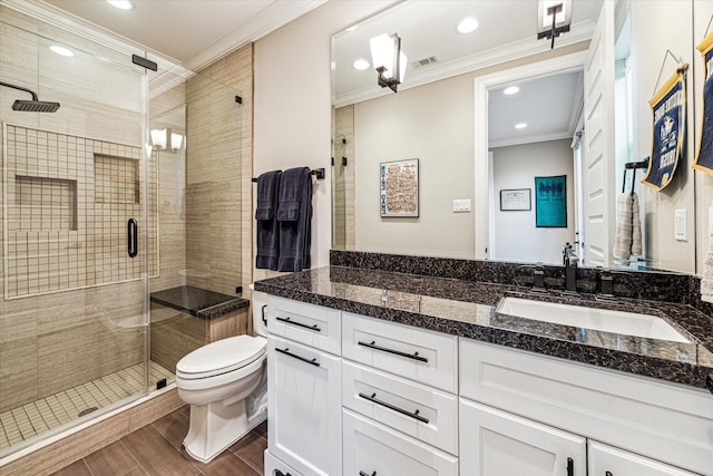1214 Dunlavy St, Houston, TX 77019 - bathroom with crown molding, toilet, vanity, a shower stall, and recessed lighting