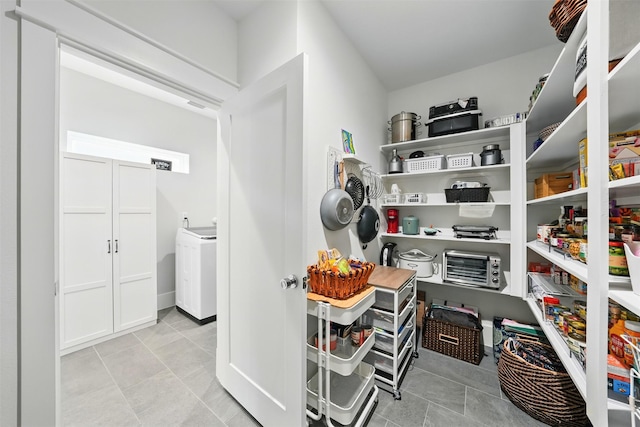 storage area featuring washer / dryer