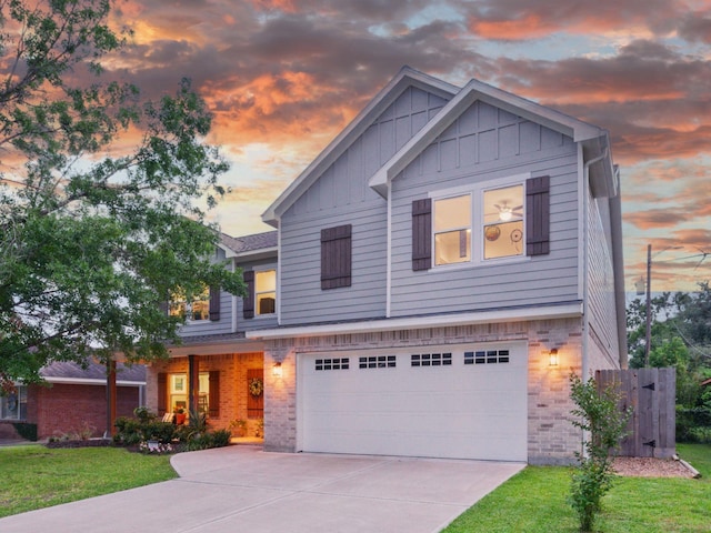 view of front facade with concrete driveway, board and batten siding, a garage, and brick siding