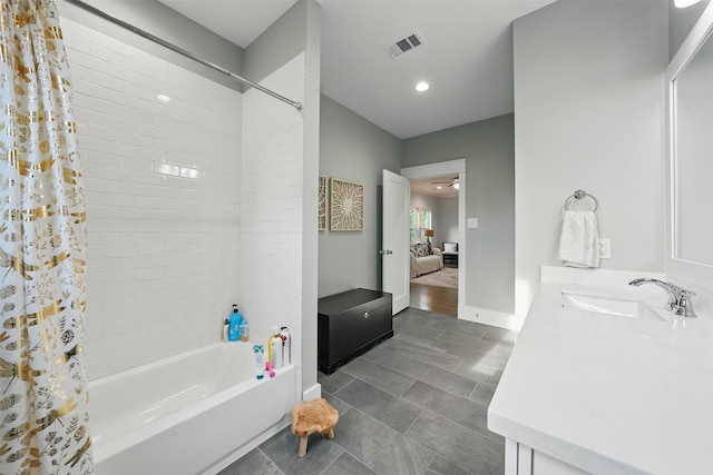 bathroom with shower / bath combo, vanity, ensuite bath, recessed lighting, and tile patterned floors