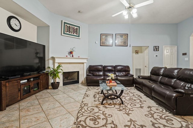 20714 Delta Wood Trl, Humble, TX 77346 - tiled living area featuring ceiling fan and a fireplace