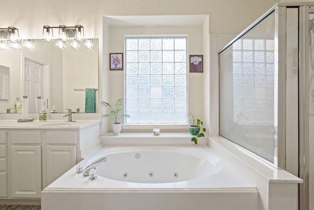 20714 Delta Wood Trl, Humble, TX 77346 - bathroom featuring a jetted tub, vanity, and a stall shower