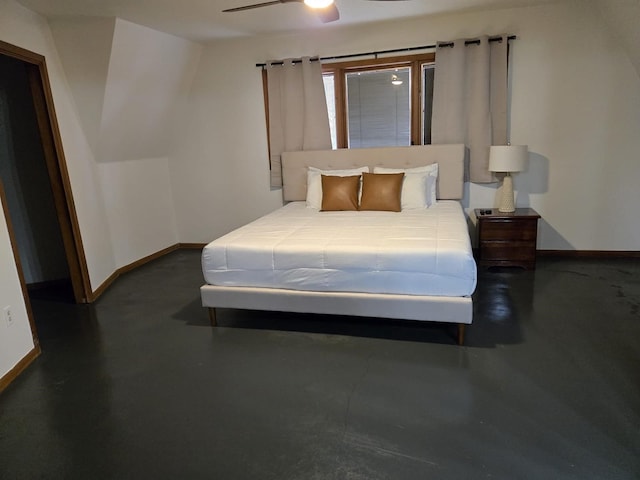 bedroom featuring baseboards, a ceiling fan, and concrete floors