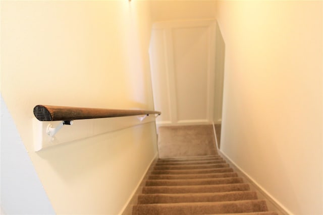 6103 Portal Dr, Houston, TX 77096 - stairway with carpet floors and baseboards