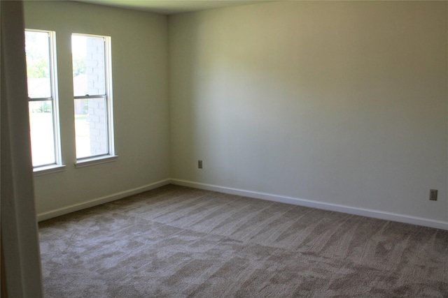 6103 Portal Dr, Houston, TX 77096 - carpeted empty room featuring baseboards