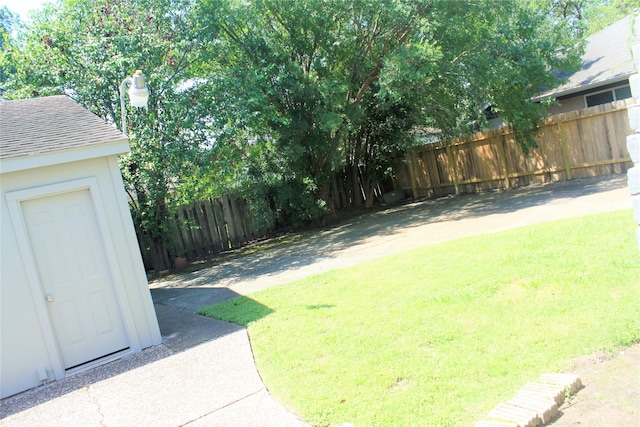 6103 Portal Dr, Houston, TX 77096 - view of yard featuring an outbuilding
