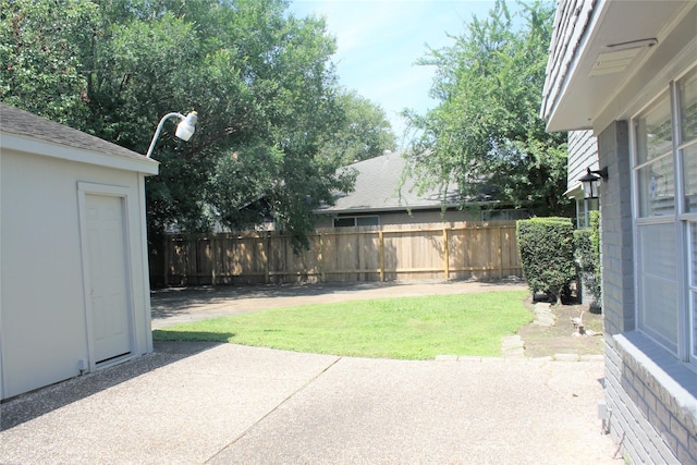 6103 Portal Dr, Houston, TX 77096 - view of yard featuring a patio area