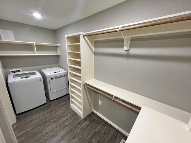 37 Ranch House Loop, Angleton, TX 77515 - washroom featuring washer and dryer, laundry area, and wood tiled floor