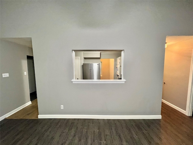 37 Ranch House Loop, Angleton, TX 77515 - unfurnished room featuring wood finished floors and baseboards
