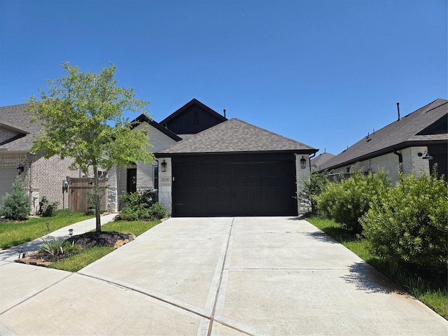 9714 Perdita Trl, Missouri City, TX 77459 - ranch-style house featuring an attached garage, roof with shingles, fence, and driveway