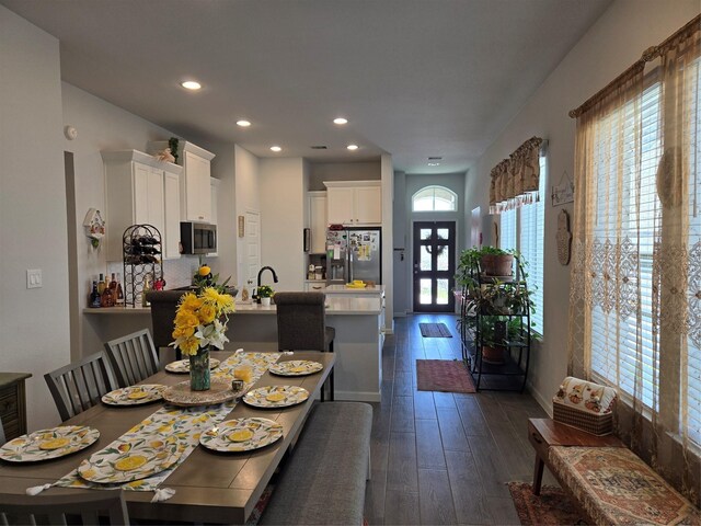 9714 Perdita Trl, Missouri City, TX 77459 - dining room featuring dark wood-type flooring, recessed lighting, and baseboards