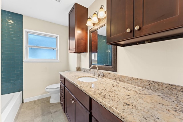 full bathroom with toilet, baseboards, vanity, and tile patterned flooring