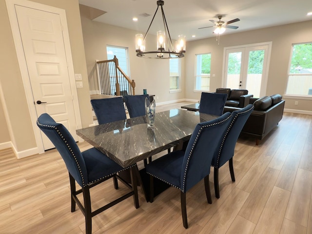 4307B Dickson St, Houston, TX 77007 - dining space featuring a chandelier, light wood-style floors, baseboards, recessed lighting, and stairs