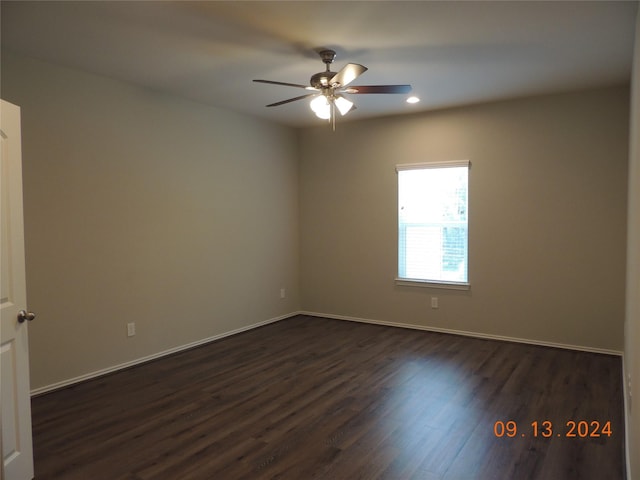 1100 Mann Rd, Conroe, TX 77303 - empty room featuring recessed lighting, baseboards, ceiling fan, and dark wood-style floors