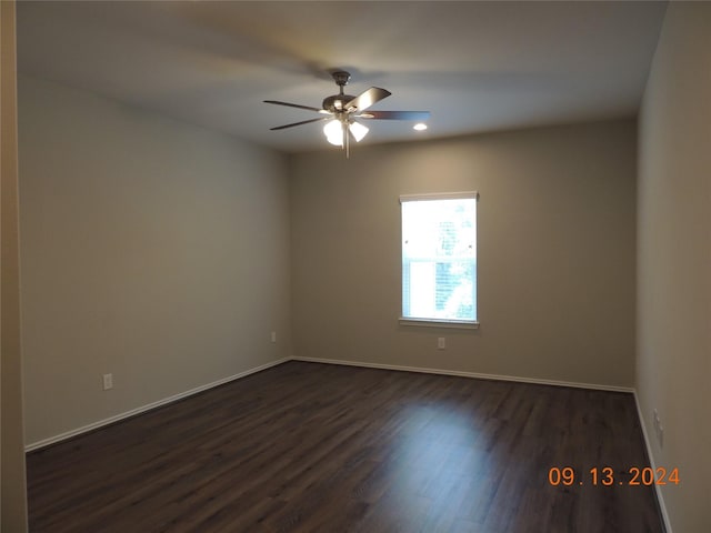 1100 Mann Rd, Conroe, TX 77303 - empty room featuring baseboards, dark wood-style flooring, recessed lighting, and ceiling fan