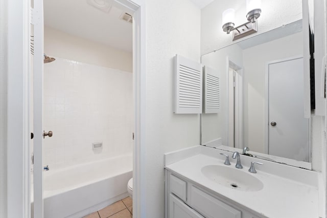 10001 Westpark Dr Unit 7, Houston, TX 77042 - full bath featuring vanity, toilet, bathtub / shower combination, and tile patterned floors