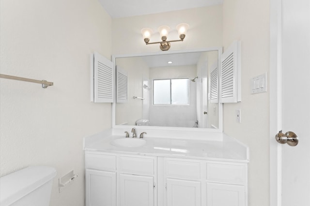 10001 Westpark Dr Unit 7, Houston, TX 77042 - bathroom with vanity, toilet, and a shower