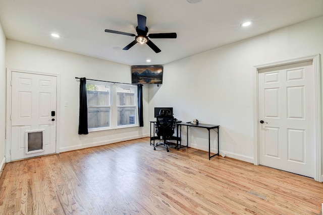 office space with baseboards, wood finished floors, a ceiling fan, and recessed lighting
