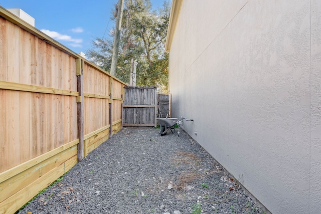 view of property exterior with fence