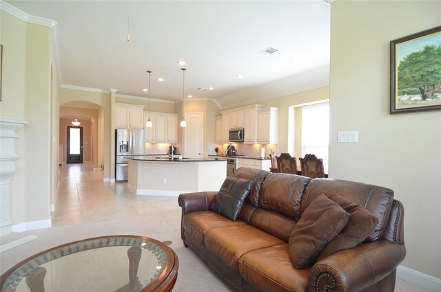 19923 Durwood Pines Ln, Cypress, TX 77433 - living area with arched walkways, recessed lighting, crown molding, baseboards, and light tile patterned floors