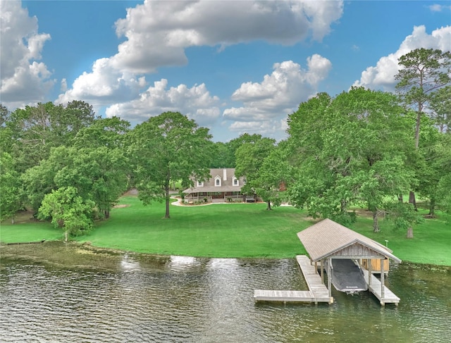 15050 Lake Paula Dr, Willis, TX 77318 - dock area featuring a water view, boat lift, and a lawn