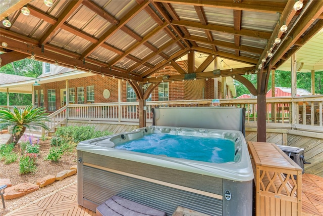 15050 Lake Paula Dr, Willis, TX 77318 - wooden terrace with a hot tub